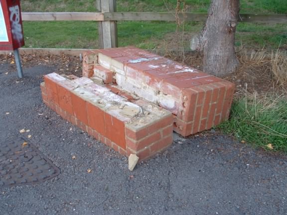 Brick plaque vandalised Brick plaque vandalised